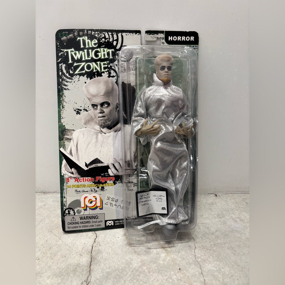 EGO The Twilight Zone Figure in Silver and Black Packaging Artwork